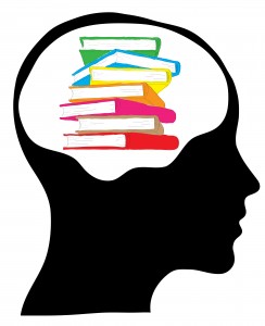 Male head silhouette with stack of books - education